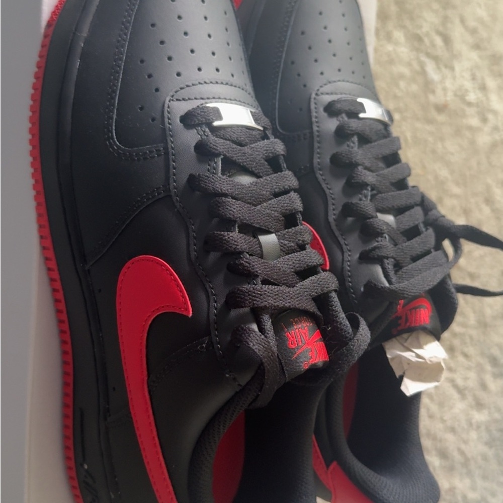 Nike Black and Red Air Force one. Brand new. Never worn